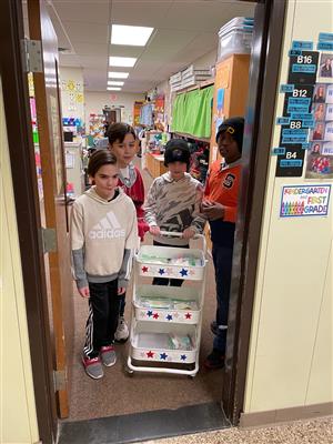  Armstrong school store team makes deliveries